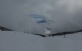 Stukje Wetterhorn door de wolken